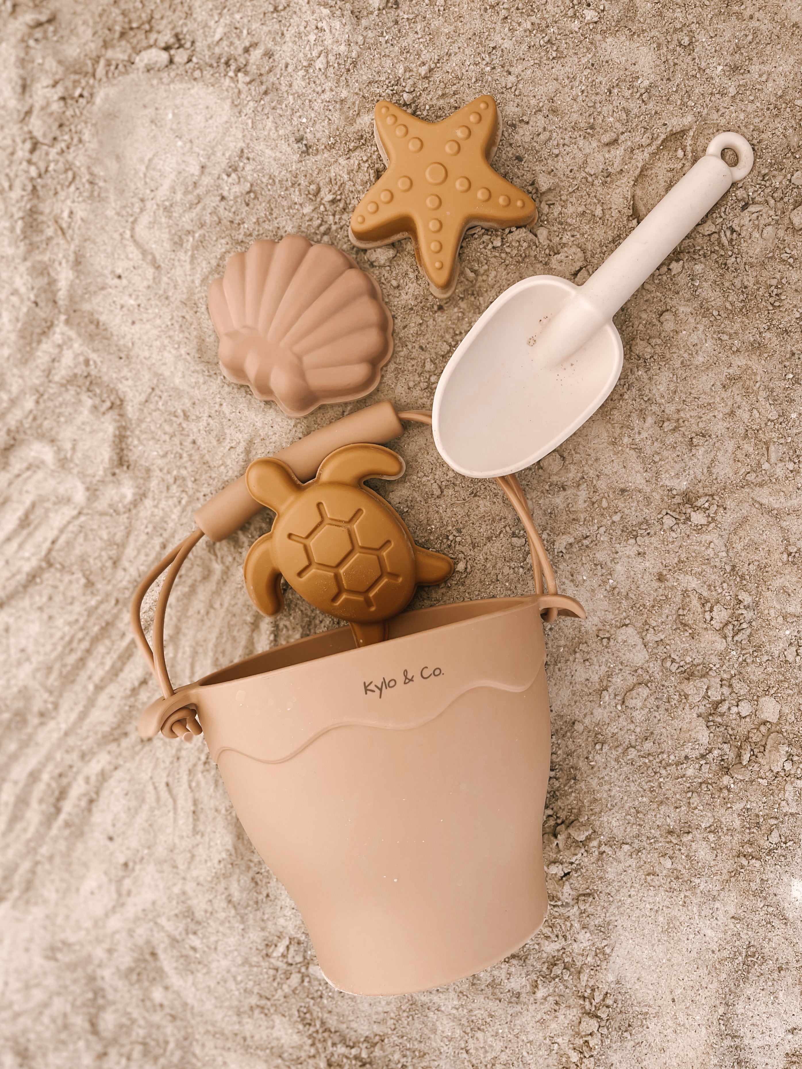 Beach sand shop bucket and shovel